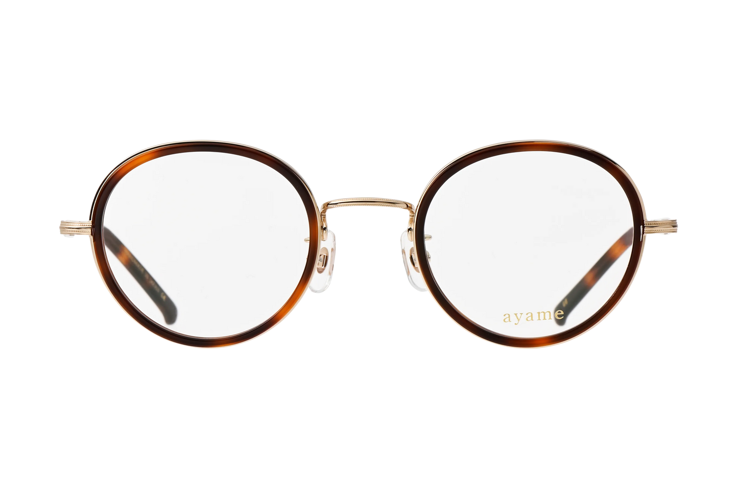 フォーカスメガネのダークタートル ダークタートルのインナーセルにホワイトゴールドのメタルコンビネーション