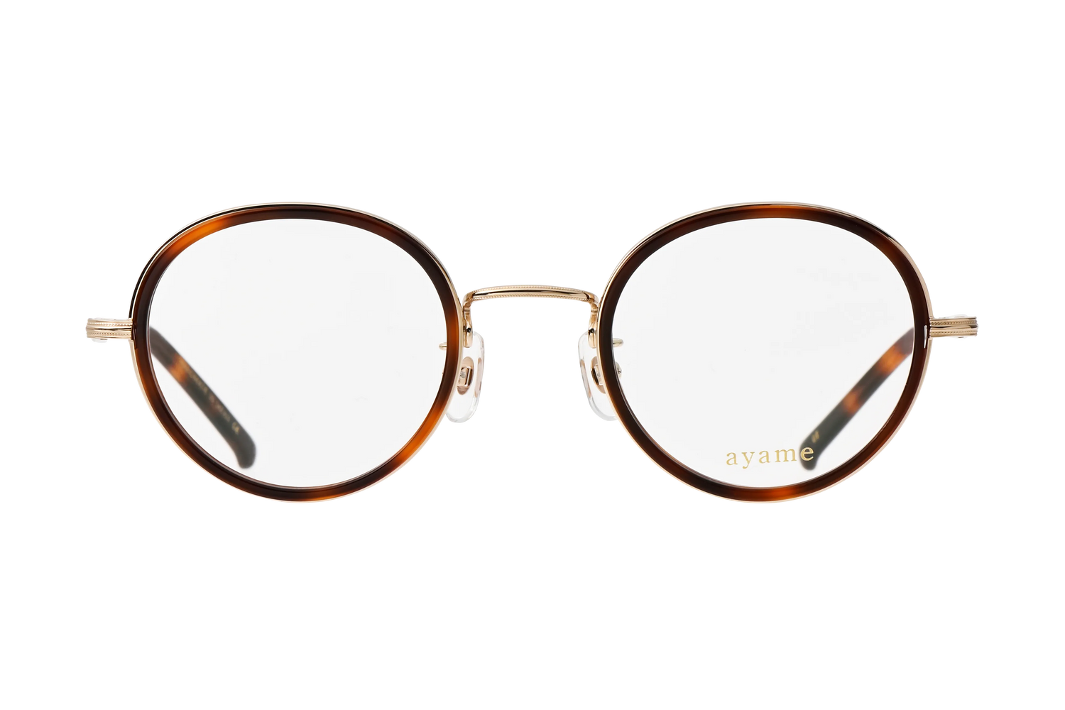 フォーカスメガネのダークタートル ダークタートルのインナーセルにホワイトゴールドのメタルコンビネーション