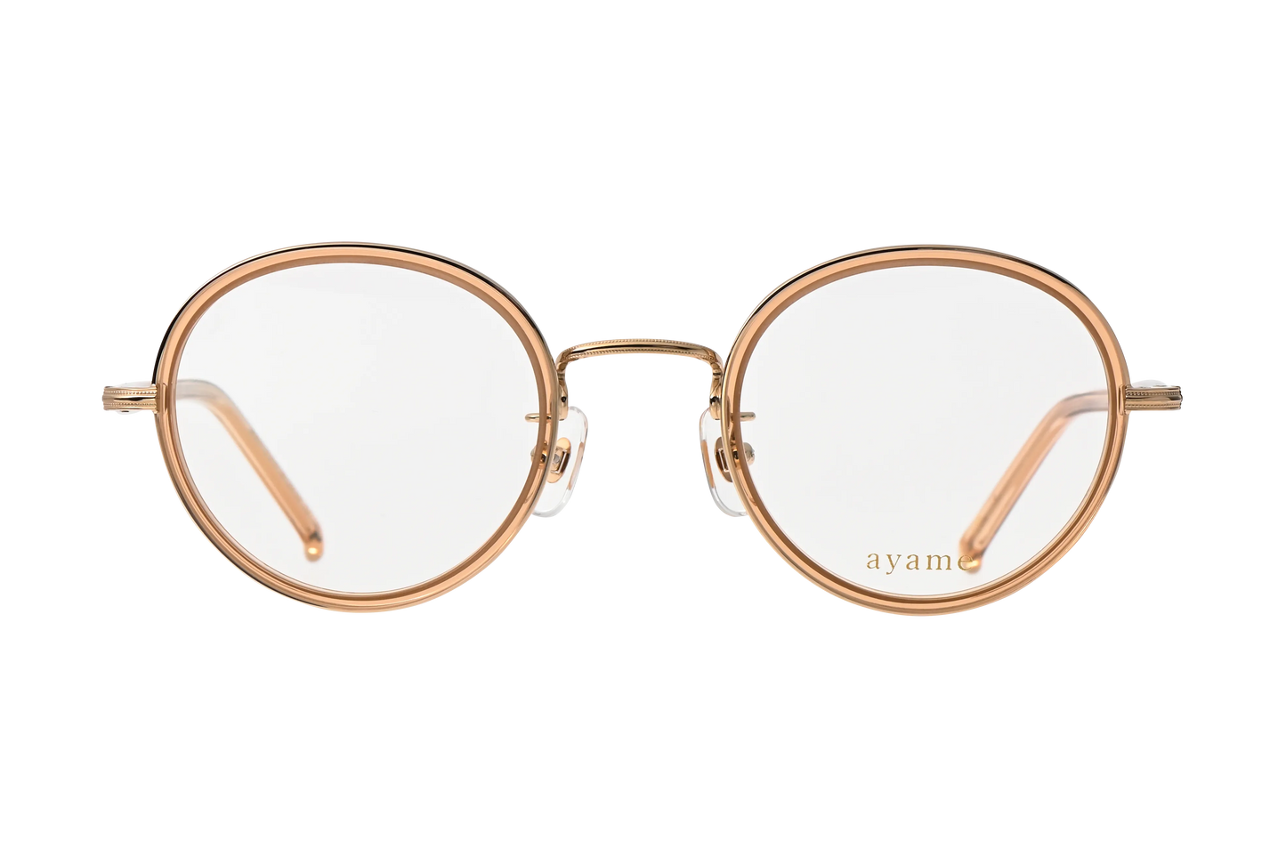 フォーカスメガネのライトブラウン正面 ライトブラウンのインナーセルにホワイトゴールドのメタルコンビネーション